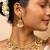 Guttapusalu necklace with pink and white stones and matching stud earrings