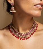 Elegant pink and gold kundan necklace set with matching earrings