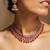 Elegant pink and gold kundan necklace set with matching earrings