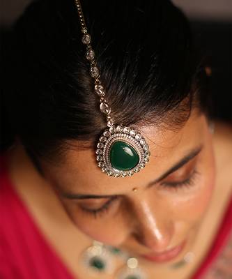 Statement green stone necklace set with kundan accents 3