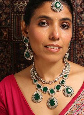 Statement green stone necklace set with kundan accents 4