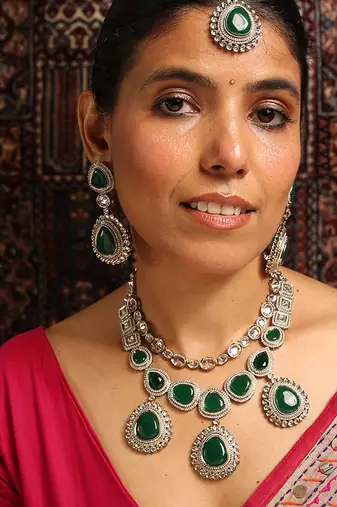Statement green stone necklace set with kundan accents
