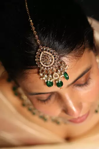 Grand kundan choker set with emerald green beads