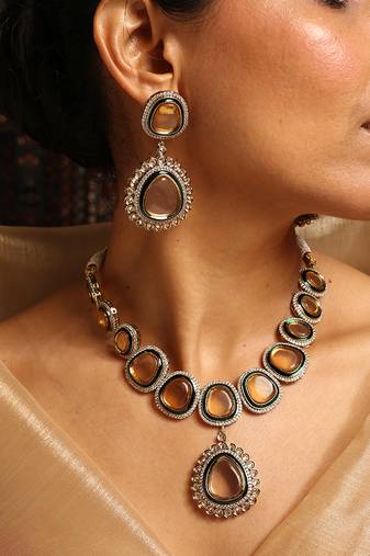 Elegant polki necklace set with champagne stones