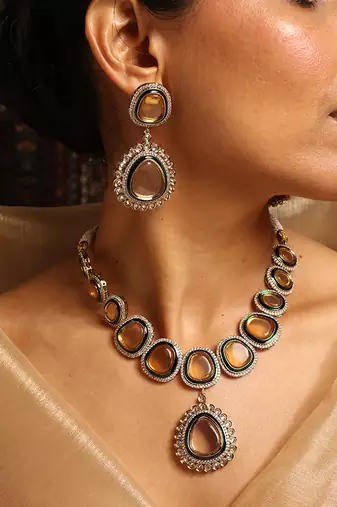 Elegant polki necklace set with champagne stones