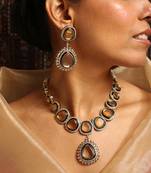 Elegant polki necklace set with champagne stones