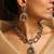 Elegant polki necklace set with champagne stones