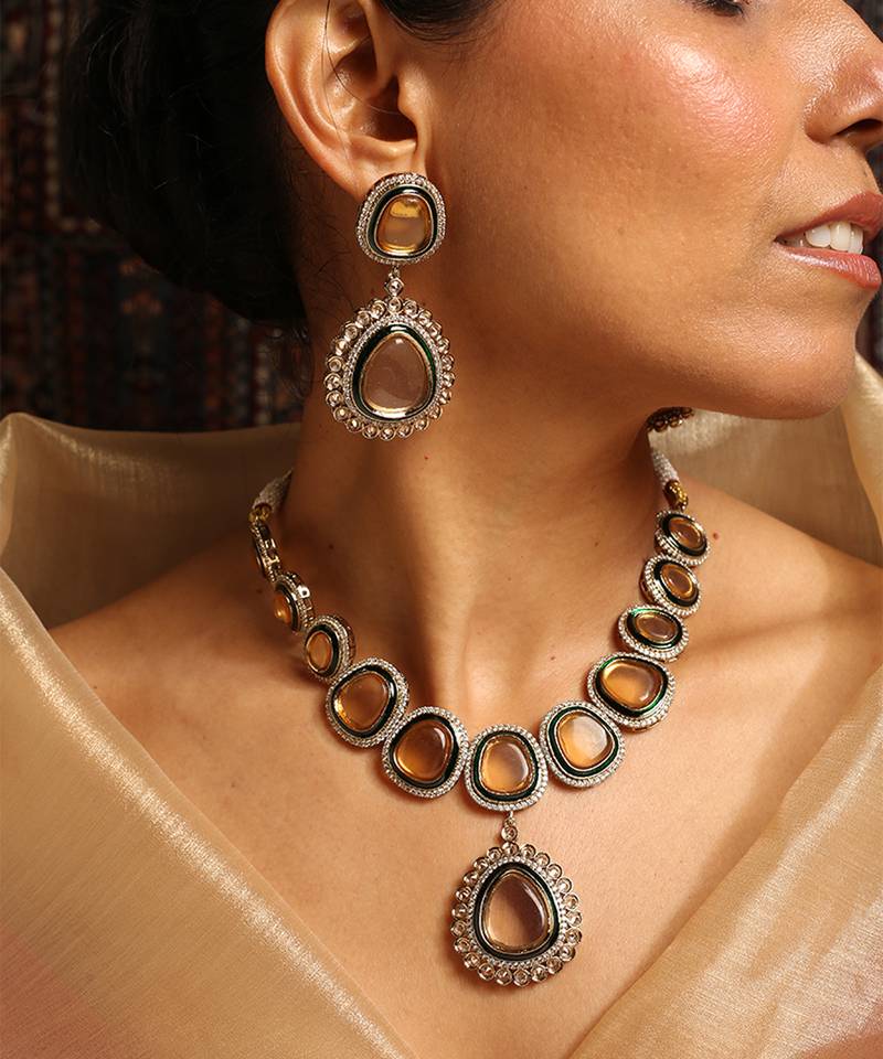 Elegant polki necklace set with champagne stones