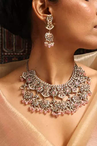 Traditional kundan and baby pink bead jewelry set