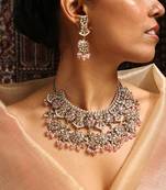 Traditional kundan and baby pink bead jewelry set