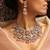 Traditional kundan and baby pink bead jewelry set