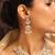 Traditional kundan and baby pink bead jewelry set