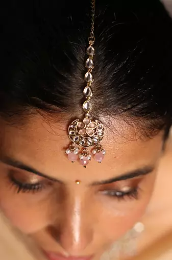 Traditional kundan and baby pink bead jewelry set