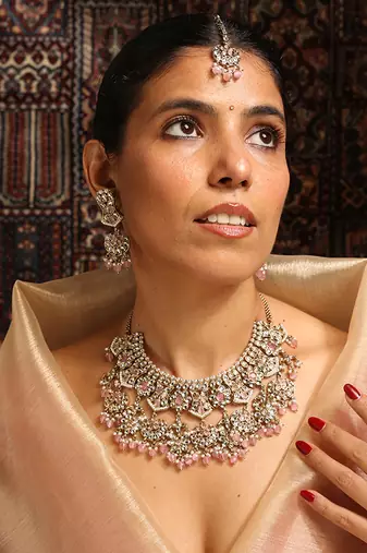 Traditional kundan and baby pink bead jewelry set