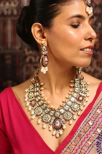 Grand bridal kundan necklace set with red enamel and pearl drops