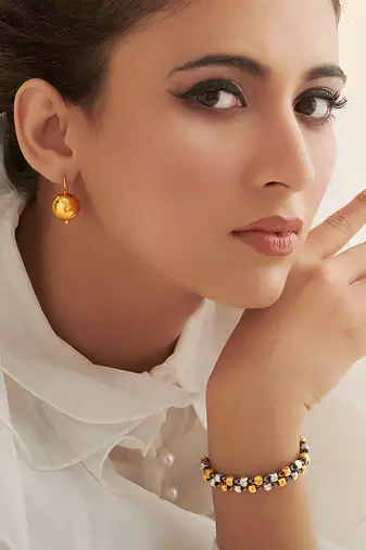 Gold plated dangler earrings in sterling silver