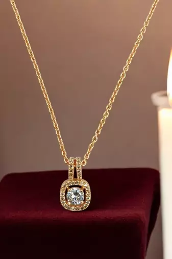 Gold plated american diamond studded pendant with chain