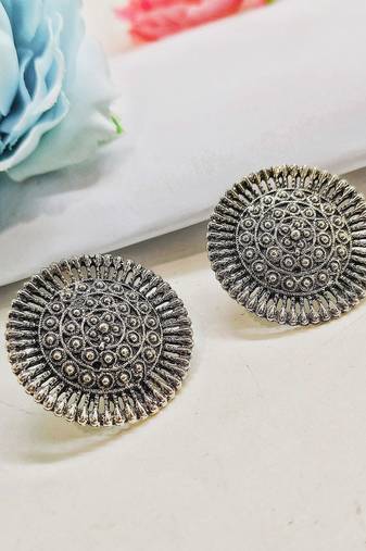 silver oxidized metal stud earrings with intricate circular design earrings