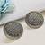 silver oxidized metal stud earrings with intricate circular design earrings