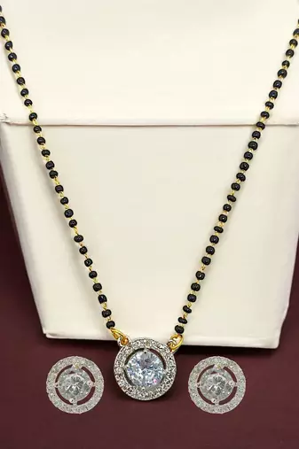 Gold plated black beaded silver ad stone mangalsutra with earrings
