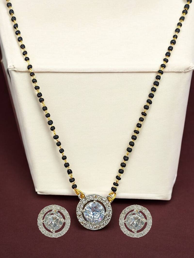 Gold plated black beaded silver ad stone mangalsutra with earrings