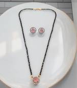 Gold plated black beaded pink ad stone mangalsutra with earrings