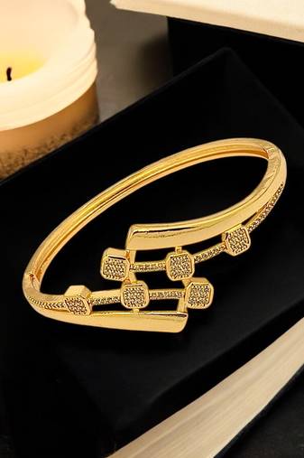 Gold plated statement kada bracelet