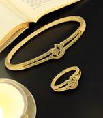 Gold plated cubic zircon studded star & moon design bracelet with ring