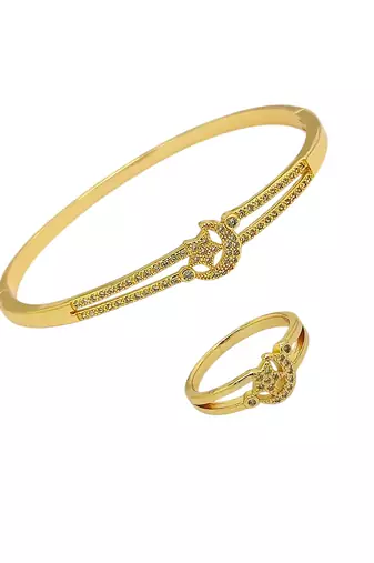 Gold plated cubic zircon studded star & moon design bracelet with ring