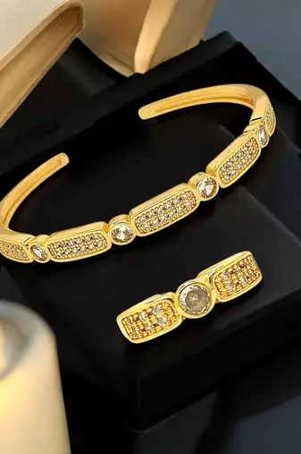 Gold plated zirconia studded cuff bracelet with ring