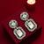 Silver plated american diamond studded drop earrings