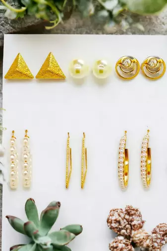 Radiant harmony: luxurious gold-plated and pearl fusion stud and hoop earring collection