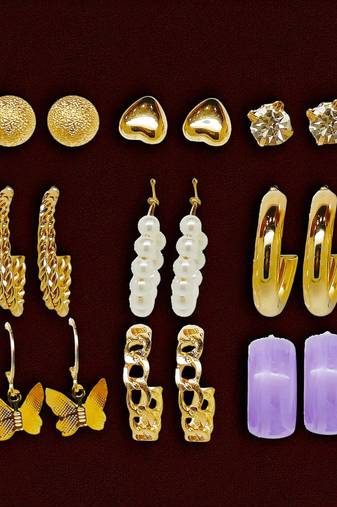 Gleaming harmony: 9-piece gold plated hoop and stud earring collection