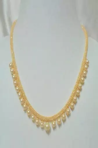 Gold color pearls necklace