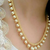Gold color pearls necklace