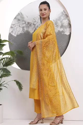 yellow solid straight silk blend sleeveless kurta trouser dupatta set