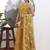 mustard silk blend halter neck kurta palazoo set