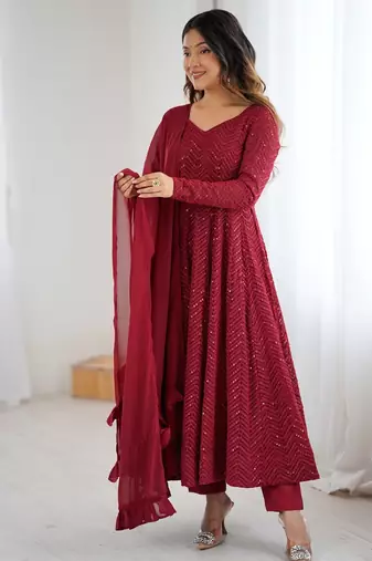Elegant maroon anarkali set with ruffled dupatta and intricate embroidery