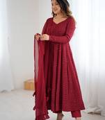 Elegant maroon anarkali set with ruffled dupatta and intricate embroidery