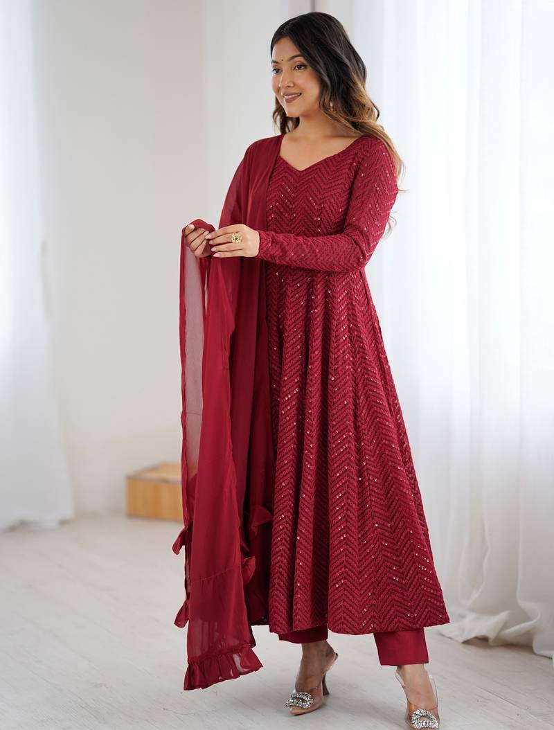 Elegant maroon anarkali set with ruffled dupatta and intricate embroidery
