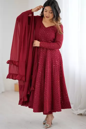 Elegant maroon anarkali set with ruffled dupatta and intricate embroidery