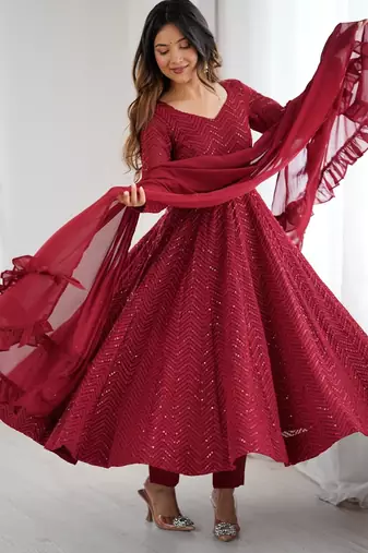 Elegant maroon anarkali set with ruffled dupatta and intricate embroidery
