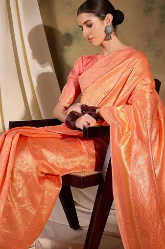 Soft peach banarasi silk saree with elegant weaving