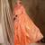 Soft peach banarasi silk saree with elegant weaving