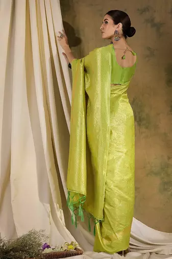 Refreshing pista green banarasi silk saree with weaving work