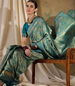 Striking teal banarasi silk saree with weaving details