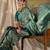 Striking teal banarasi silk saree with weaving details