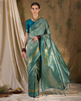 Striking teal banarasi silk saree with weaving details 2