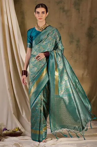 Striking teal banarasi silk saree with weaving details