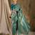 Striking teal banarasi silk saree with weaving details
